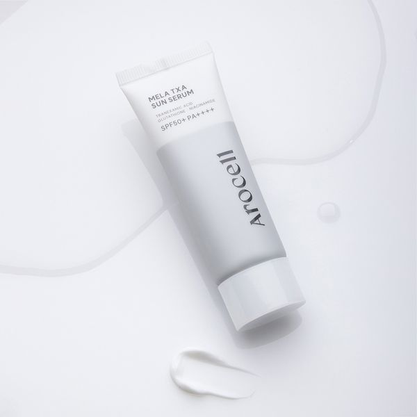 Сонцезахисна крем-сироватка Arocell Mela TXA Sun Serum 40 мл з транексамовою кислотою та глутатіоном 3091971393 фото