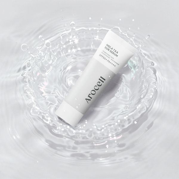 Сонцезахисна крем-сироватка Arocell Mela TXA Sun Serum 40 мл з транексамовою кислотою та глутатіоном 3091971393 фото