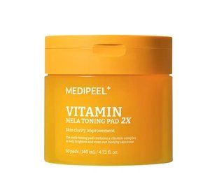 Тонизирующие витаминные педы для лица MEDIPEEL Vitamin Mela Toning Pad 2X 50 шт. 2868337133 фото