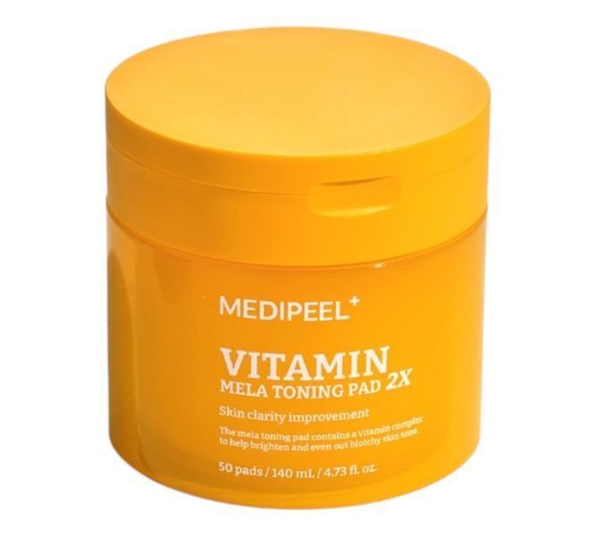 Тонізуючі вітамінні педи для обличчя MEDIPEEL Vitamin Mela Toning Pad 2X 50 шт. 2868337133 фото