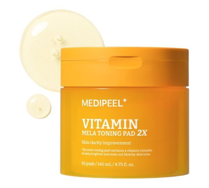 Тонізуючі вітамінні педи для обличчя MEDIPEEL Vitamin Mela Toning Pad 2X 50 шт. 2868337133 фото